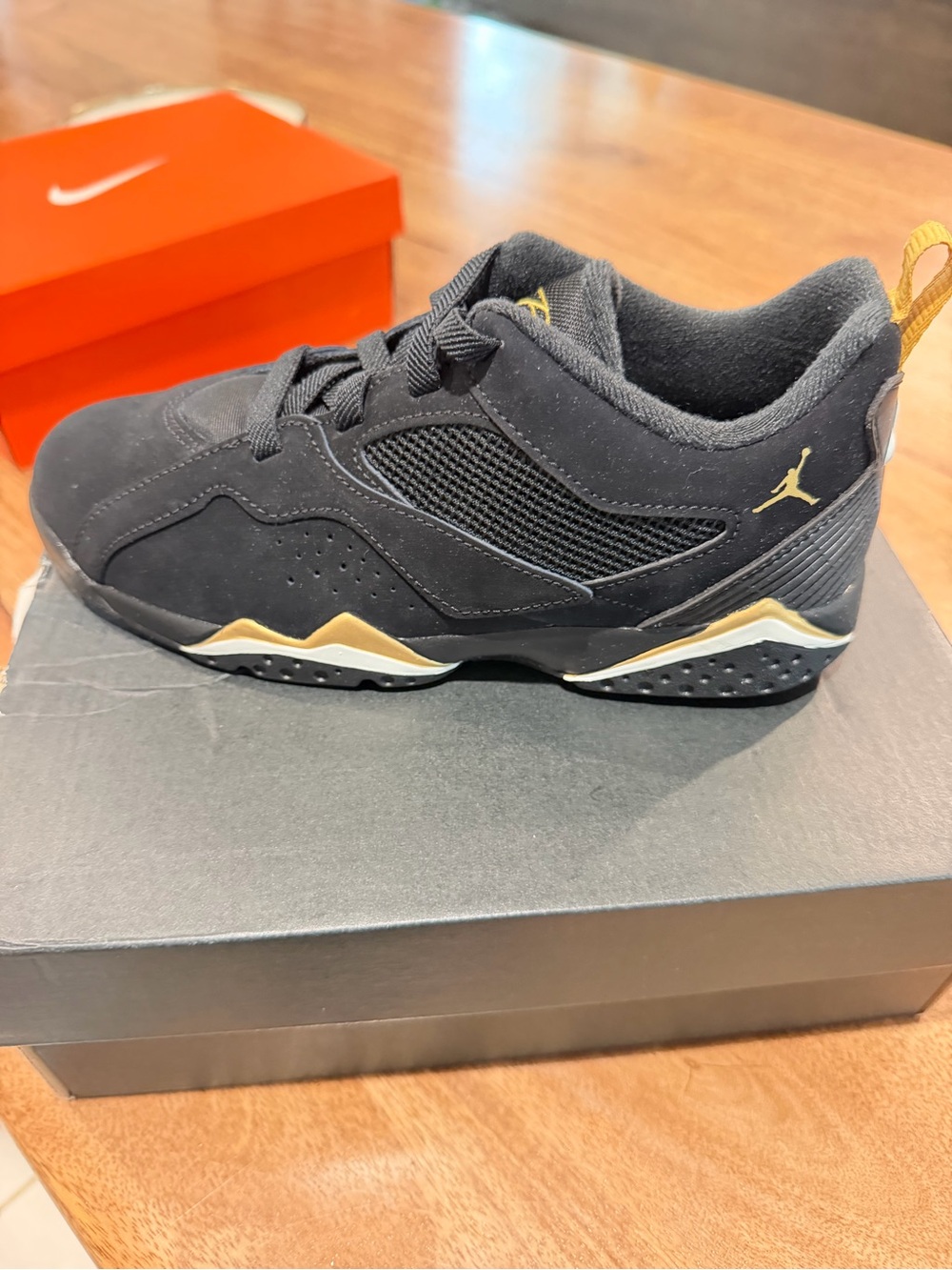 Jordan Kids Black and Gold Low-Top Sneaker